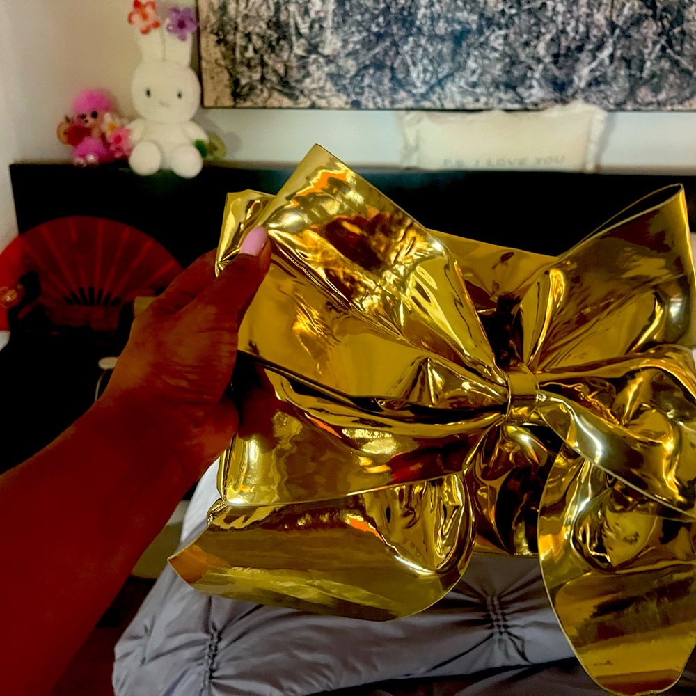 Clutch great for lounge, party and any outing occasion. Gold and original